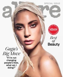 Close-up portrait of Lady Gaga with braided blonde hair and neutral makeup for an Allure magazine cover by photographer Dan Jackson.