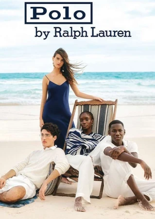 Fashion campaign featuring a group of models posed on a sandy beach with ocean backdrop, promoting Ralph Lauren's Polo collection.