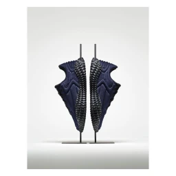 Two dark blue sneakers mounted vertically on black stands against a clean white background