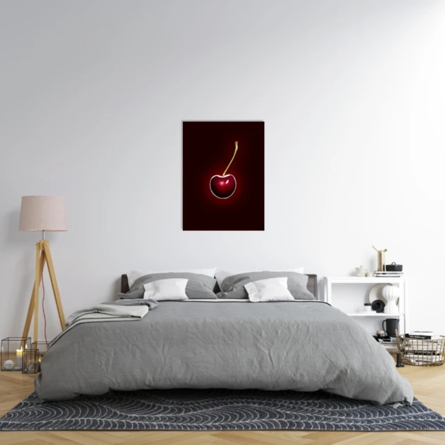 Bedroom features a gray upholstered bed, a nightstand with a lamp, and a framed photograph of a cherry on the wall.