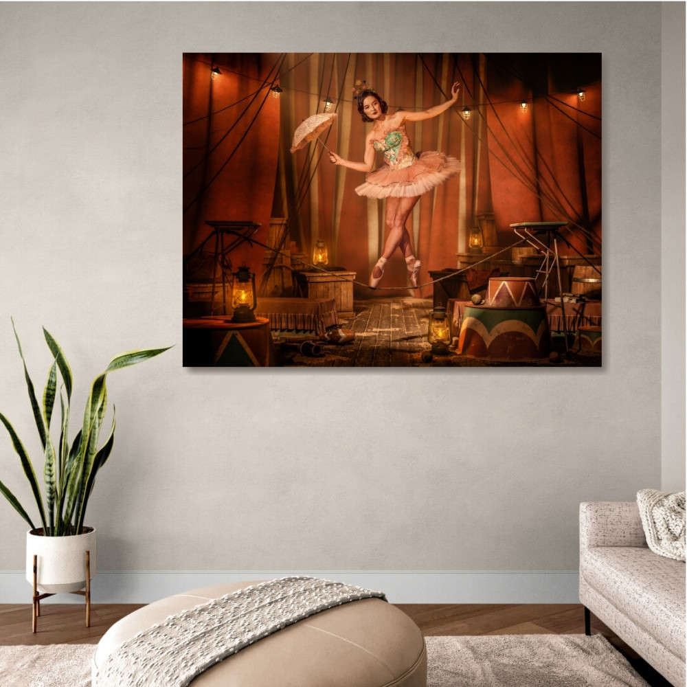 A captivating theatrical display on canvas showcases a woman ballet dancer en pointe, holding a parasol, against a textured orange-brown stage.