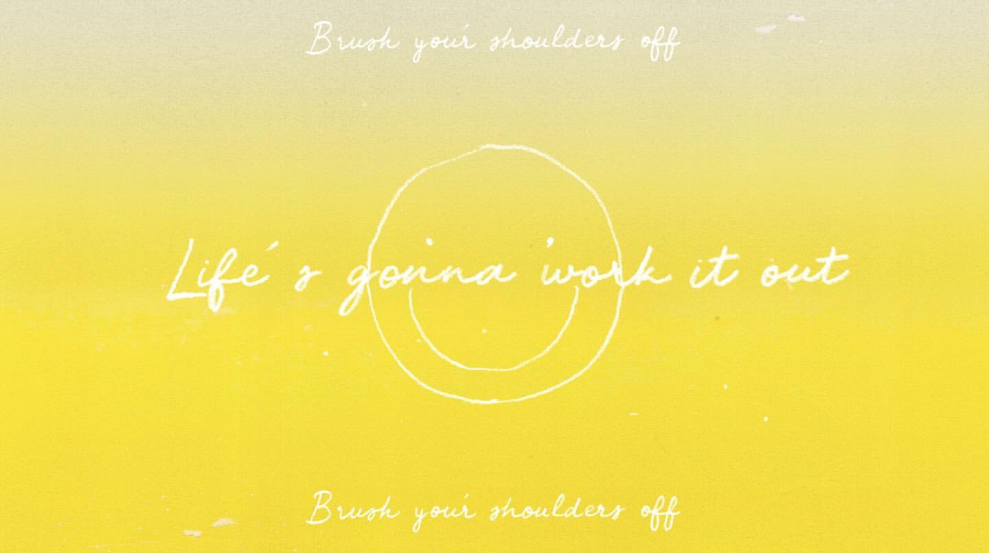 Yellow background with white text art, including the phrase 'Life's gonna work it out' in a script font with smiley face art.