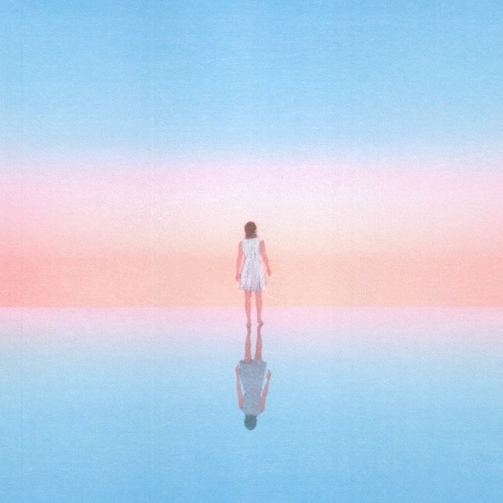 A woman in a white dress stands in a blue space with an orange sky, reflected on a flat surface. Back view, soft pastel colors, and serene.
