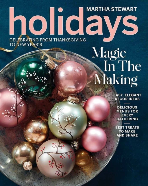 Magazine cover for Martha Stewart Holidays features decorative Christmas ornaments in pink, gold, and green in a silver bowl.