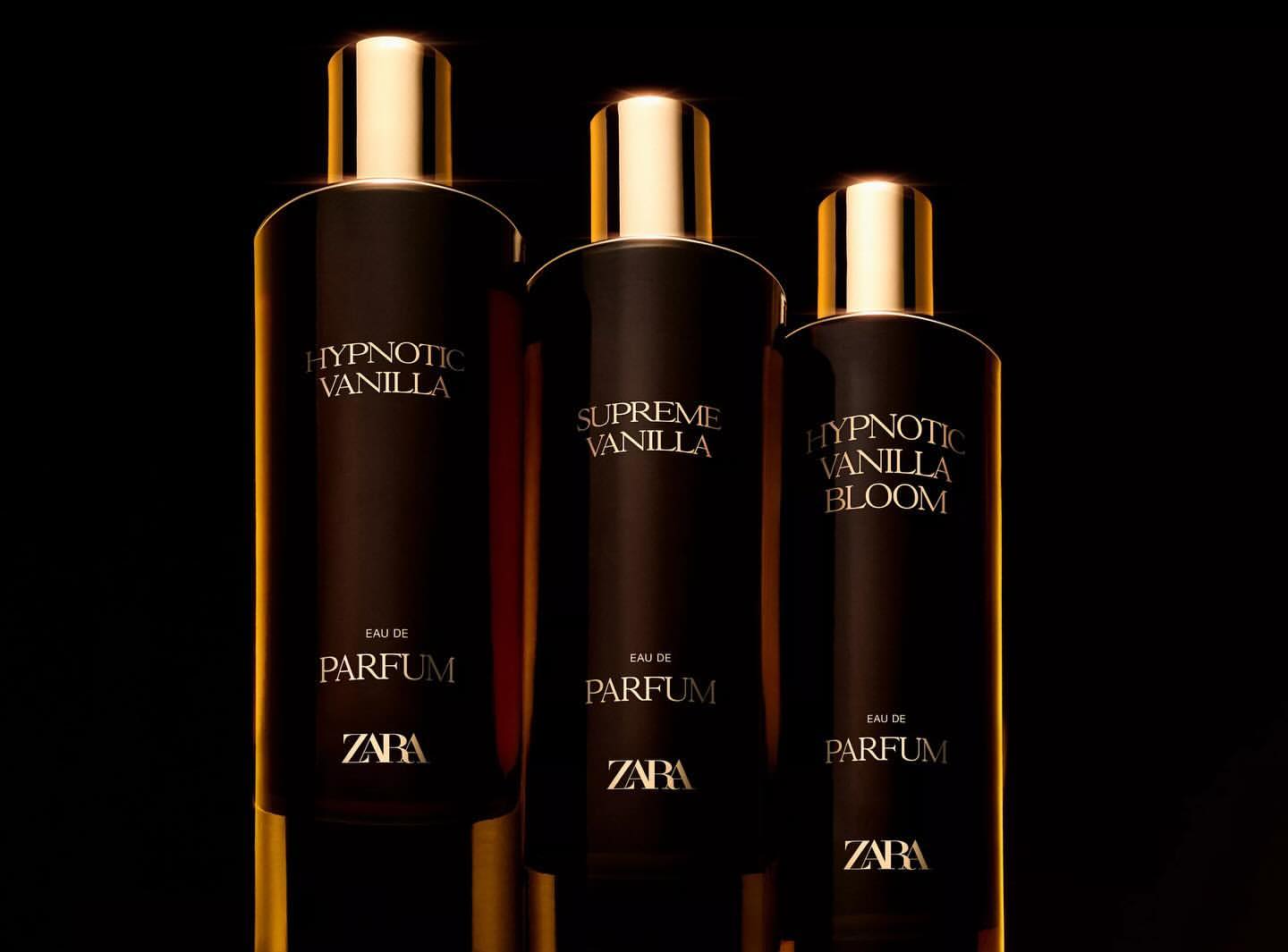 Three Zara perfume bottles are centrally placed against a dark background, featuring dark brown bottles with gold accents and clear text labels.