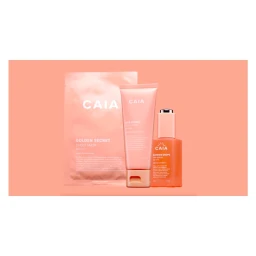 Caia cosmetic products including a sheet mask, a tube, and a dropper bottle arranged on a peachy pink background