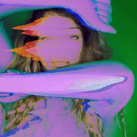 Abstract portrait of a woman with pixelated glitch effects, set against a vibrant green backdrop, showcasing a modern, digital aesthetic.