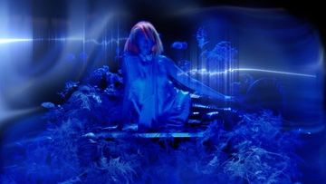 Dreamlike image featuring a woman amid blue lighting, surreal textures, and flowing organic shapes, creating an ethereal ambiance.