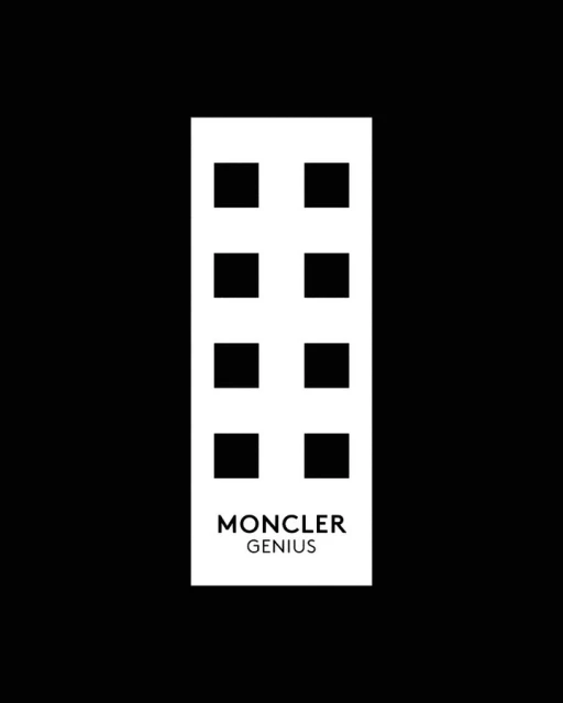 Moncler Genius logo on a rectangular shape with eight squares above the text against a dark black background in a high-contrast image.