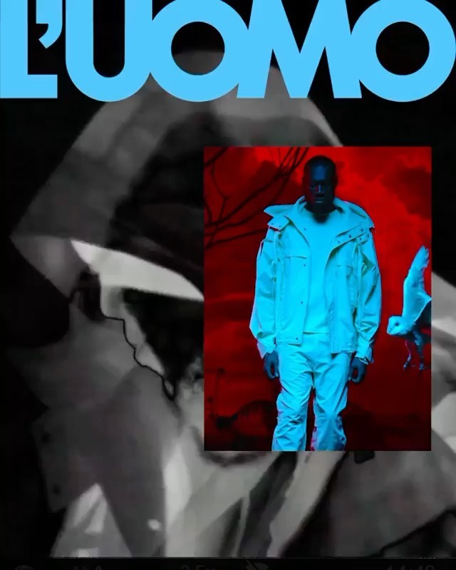 Magazine cover featuring an adult male model in an off-white jacket and pants against a red background, with an illustration on the side.