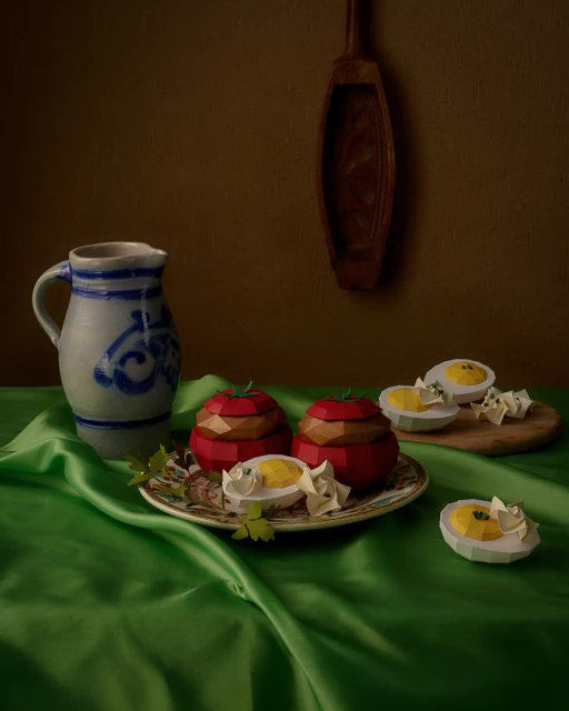 Still life of two tomato-shaped containers and egg halves on a green silk tablecloth, featuring a pitcher and wooden spoon in the background.