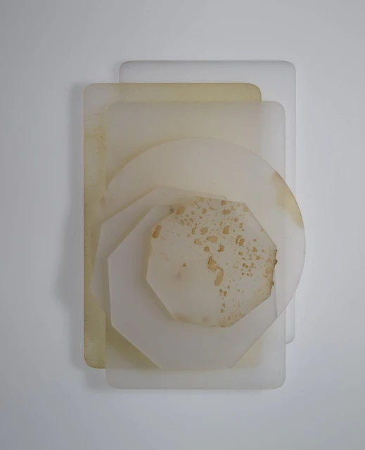 Abstract composition of layered translucent geometric shapes in neutral tones, creating a minimalist and modern art piece.