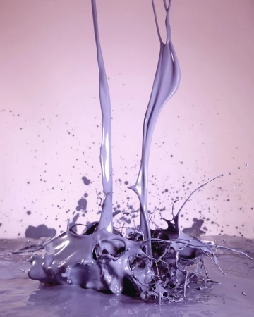 High speed photography capturing two streams of purple paint splashing and colliding against a pale background
