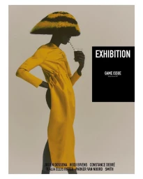 Model in yellow dress wearing a wide striped hat drinking through a straw against a light grey background