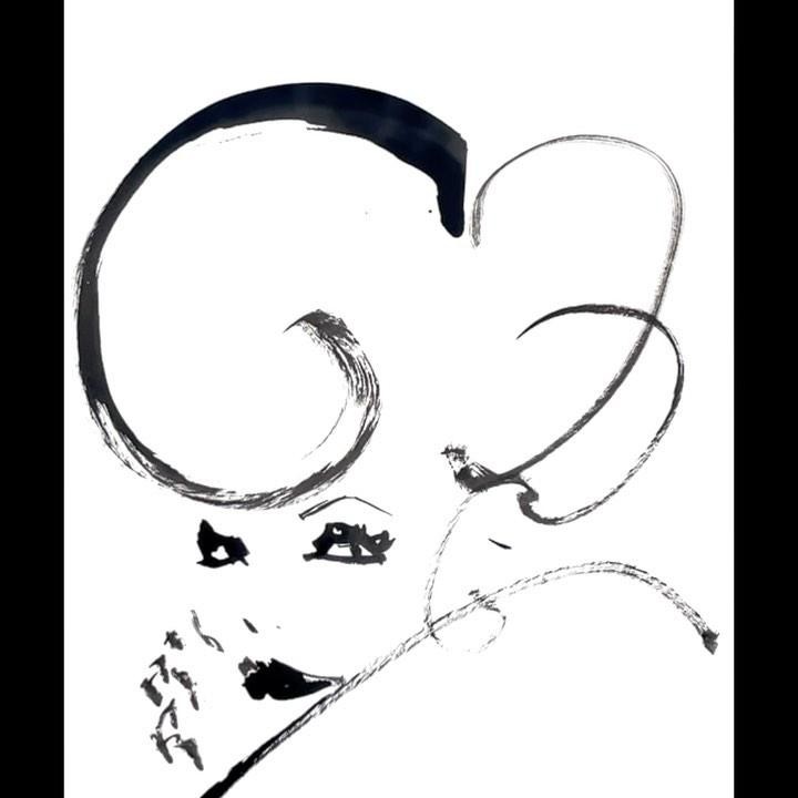 Abstract ink drawing of a face on white background. Graphic art portrait. Black ink illustration of an abstract female face with curly hair.
