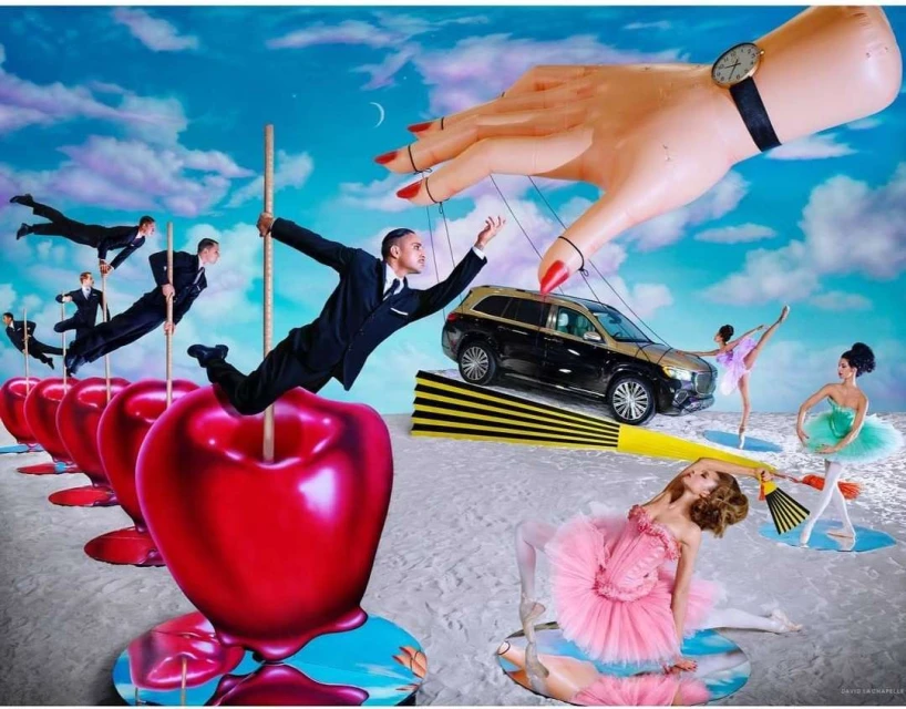 Surrealist scene featuring businessmen on poles, ballet dancers, a black SUV, and a giant hand controlling the subjects against a blue sky.