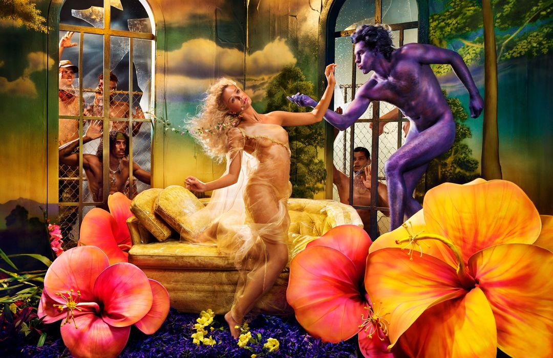 Fantasy scene with a woman in a flowing gown, a blue-skinned man, and others in a broken window, surrounded by vibrant, oversized hibiscus flowers.
