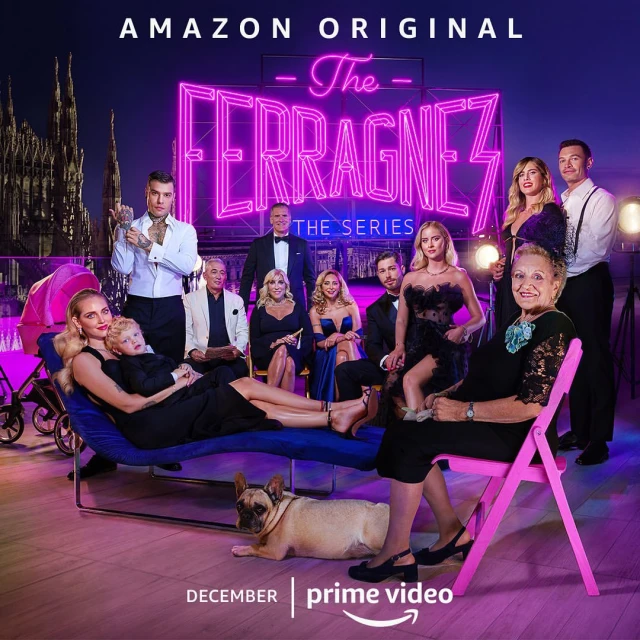 Promotional shot of The Ferragnez series cast, featuring family members of different ages and a bulldog against a nighttime cityscape backdrop.