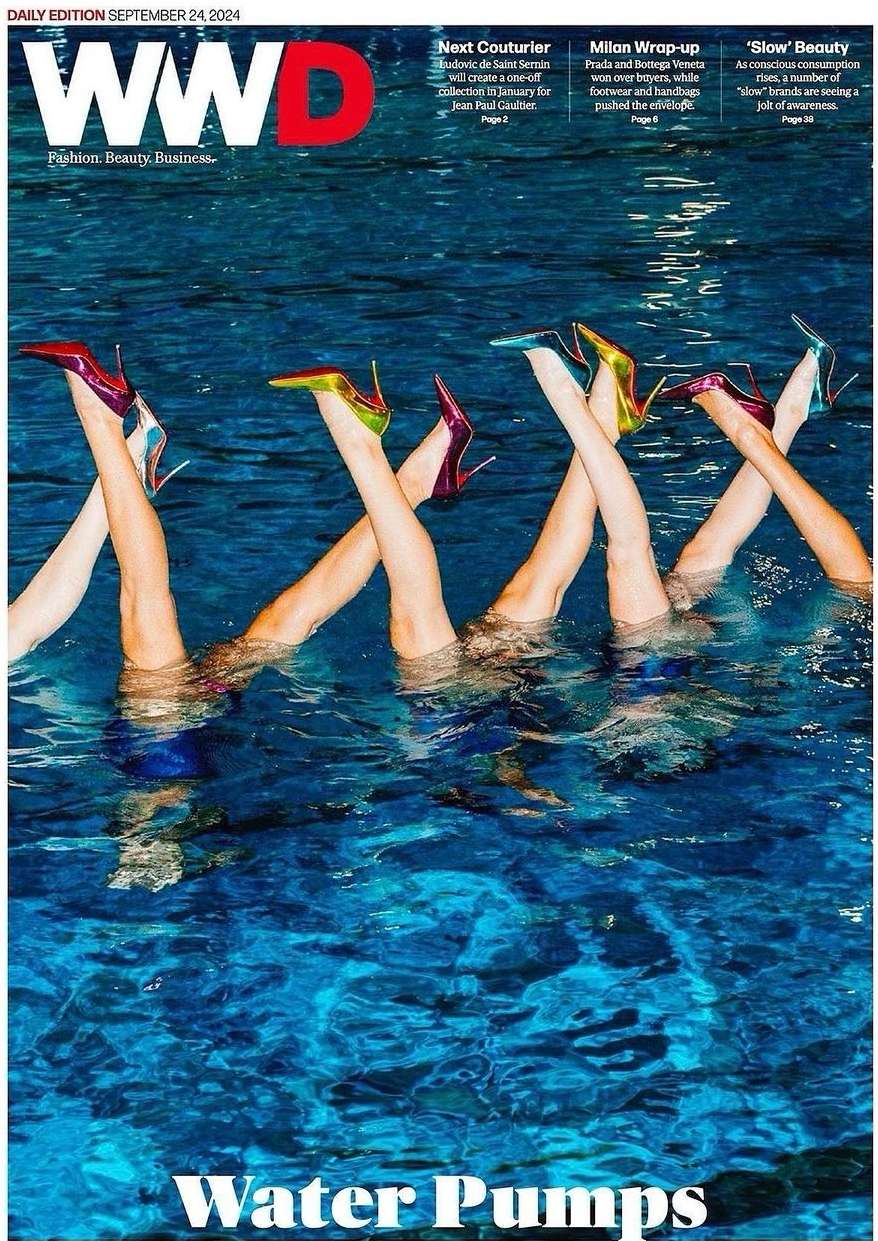 WWD magazine cover features legs in water with stiletto high heels in blue water background, promoting fashion, beauty, and business.