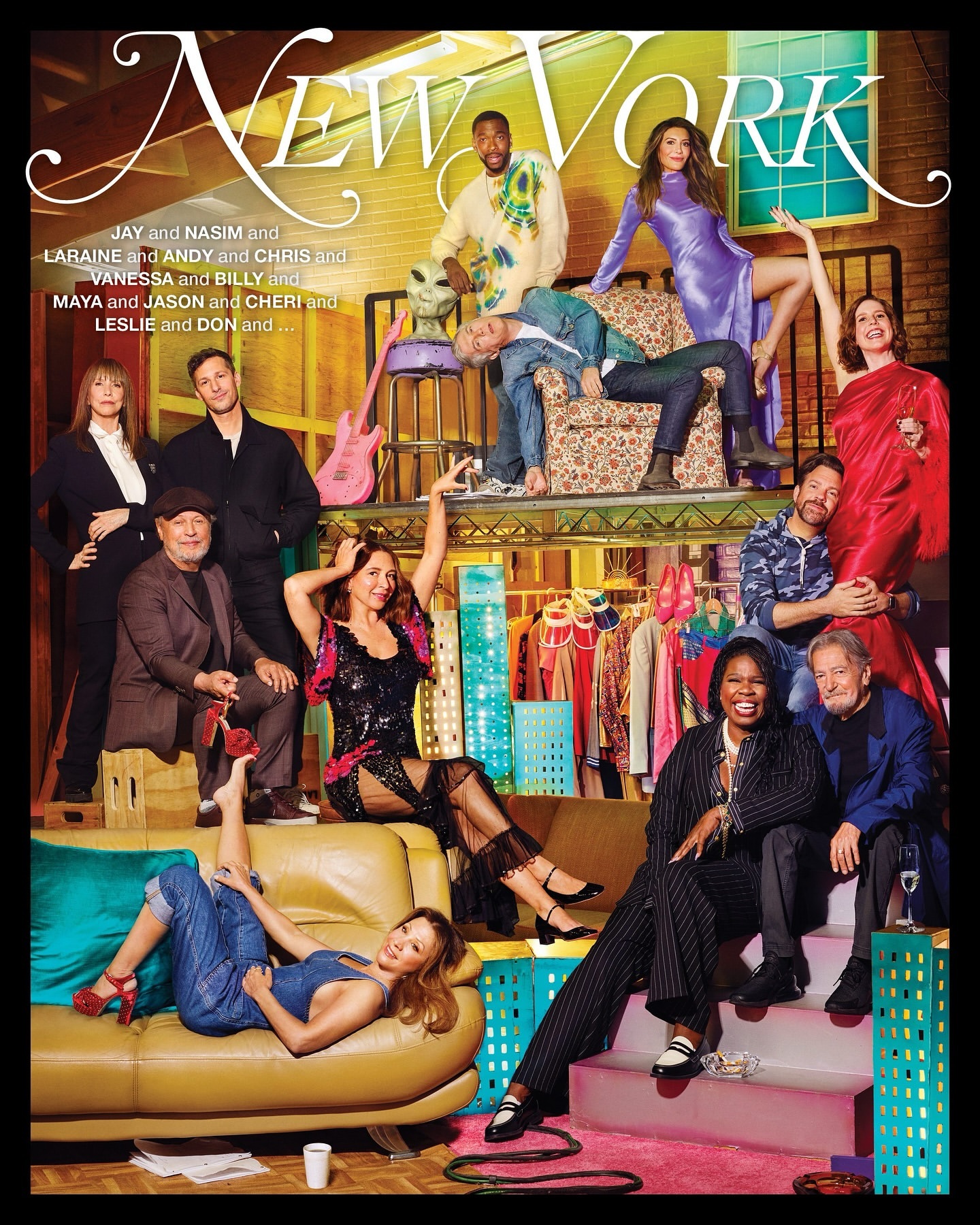 Ensemble portrait of multiple individuals posing in a vibrant set with a New York magazine header by David Lachapelle.