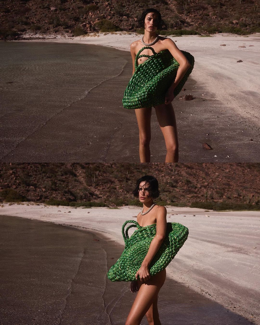 Fashion shot of a woman in swimwear on a beach holding a green woven bag. The background features an ocean and a mountain.