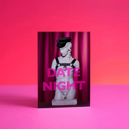Statue with BDSM gear, pink curtains and bright pink background. 'Date Night' text in pink letters is super-imposed on the image.