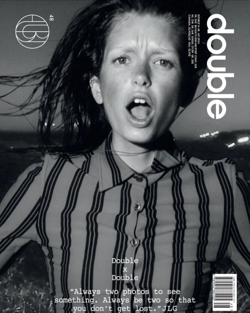 Black-and-white magazine cover featuring a young woman with an open mouth, wearing a striped shirt, against a blurred background.