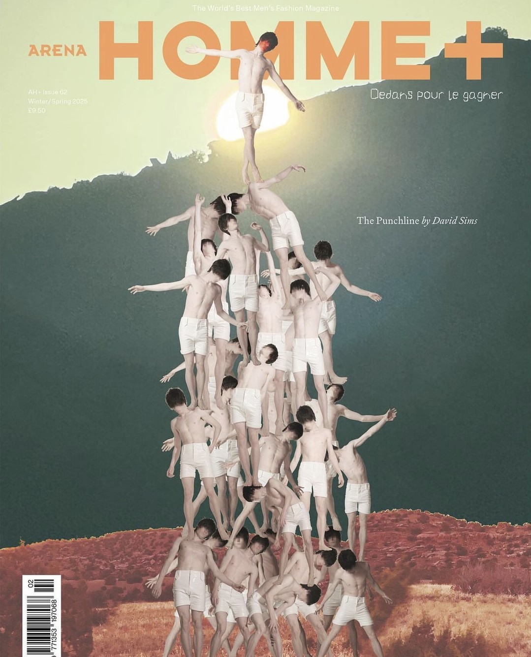 Editorial-style magazine cover shot of a human pyramid made up of shirtless young men, set against a mountain backdrop and cloudy sky.