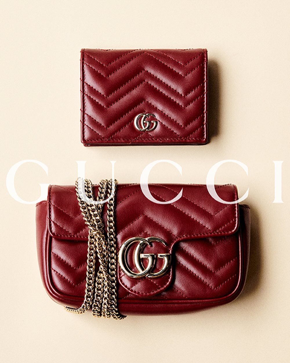 Gucci Marmont mini shoulder bag and card case wallet in lipstick red leather with chevron pattern and silver GG hardware.