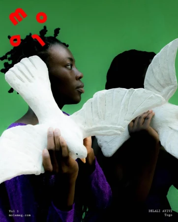 Two Black women holding white dove sculptures against a solid green background with red graphic text.