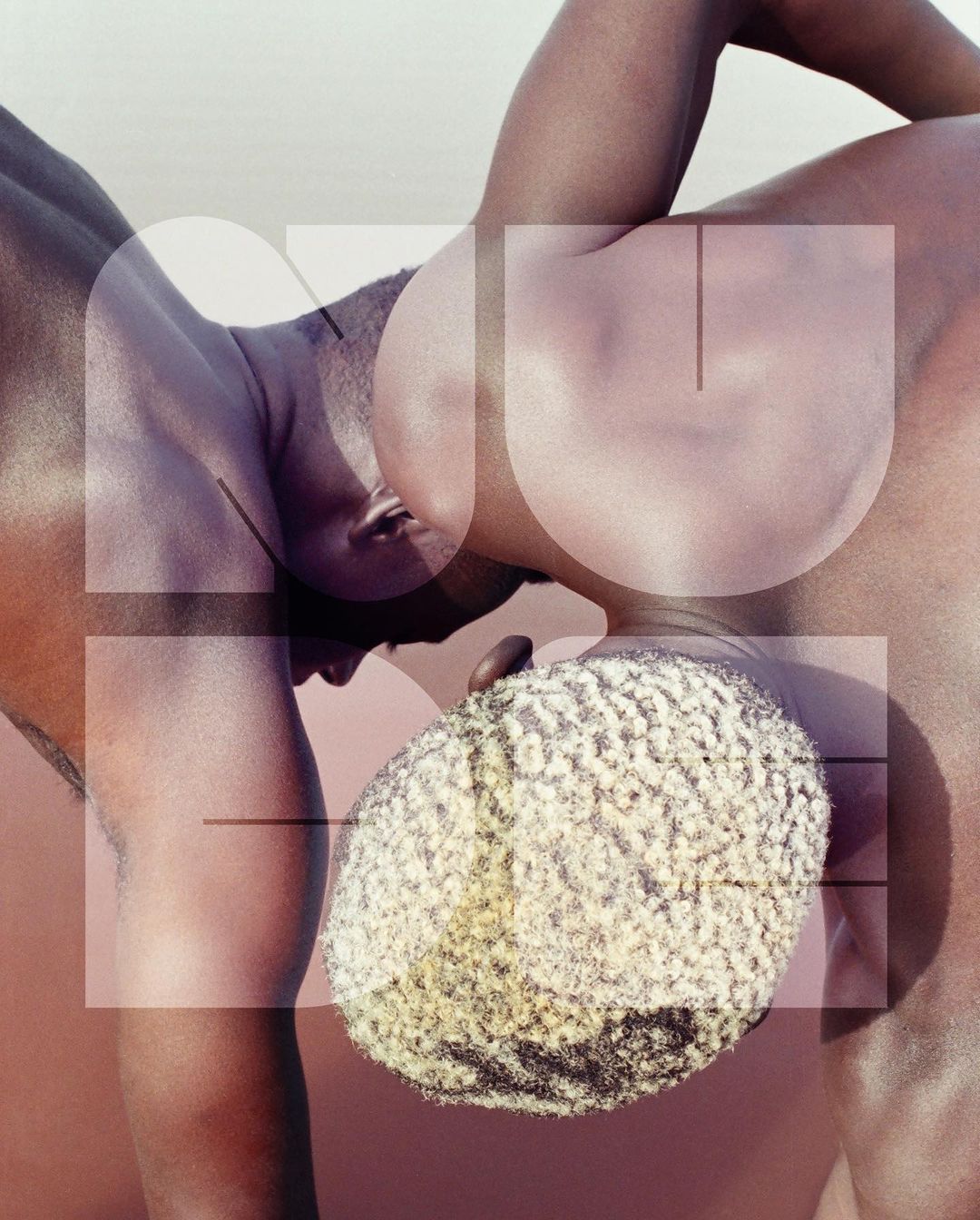 Two dark-skinned men shown from the shoulders up, close together in a studio shot with overlayed white geometric shapes.