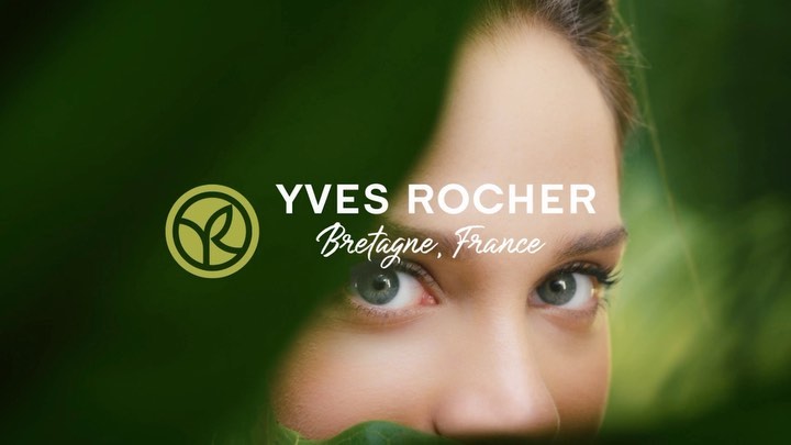 Close-up of a woman's face with Yves Rocher logo and the text 'Bretagne, France,' emphasizing beauty and cosmetics in a natural setting.