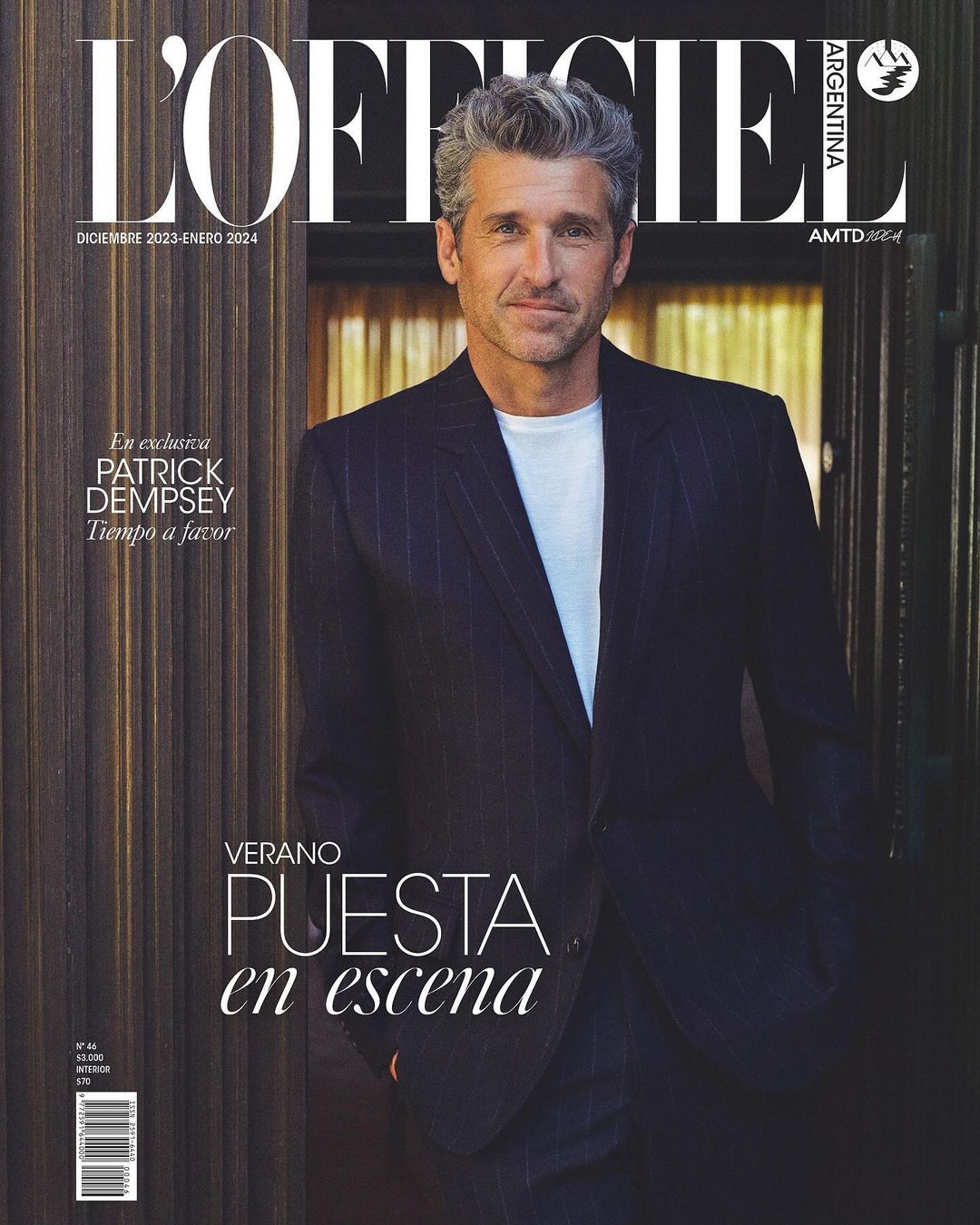 Magazine cover featuring Patrick Dempsey in a dark suit, posing against a neutral background. L'Officiel Argentina, December 2023/January 2024 issue.