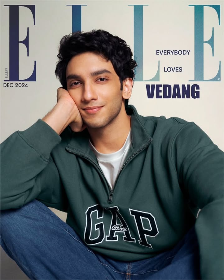 Close-up of Vedang Raina on the cover of Elle magazine, December 2024 issue, wearing a green GAP sweatshirt and jeans.
