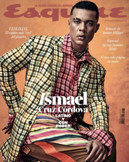 Magazine cover featuring Ismael Cruz Cordova in a patterned blazer and colorful shirt, set against a muted orange background with 'Esquire' logo.