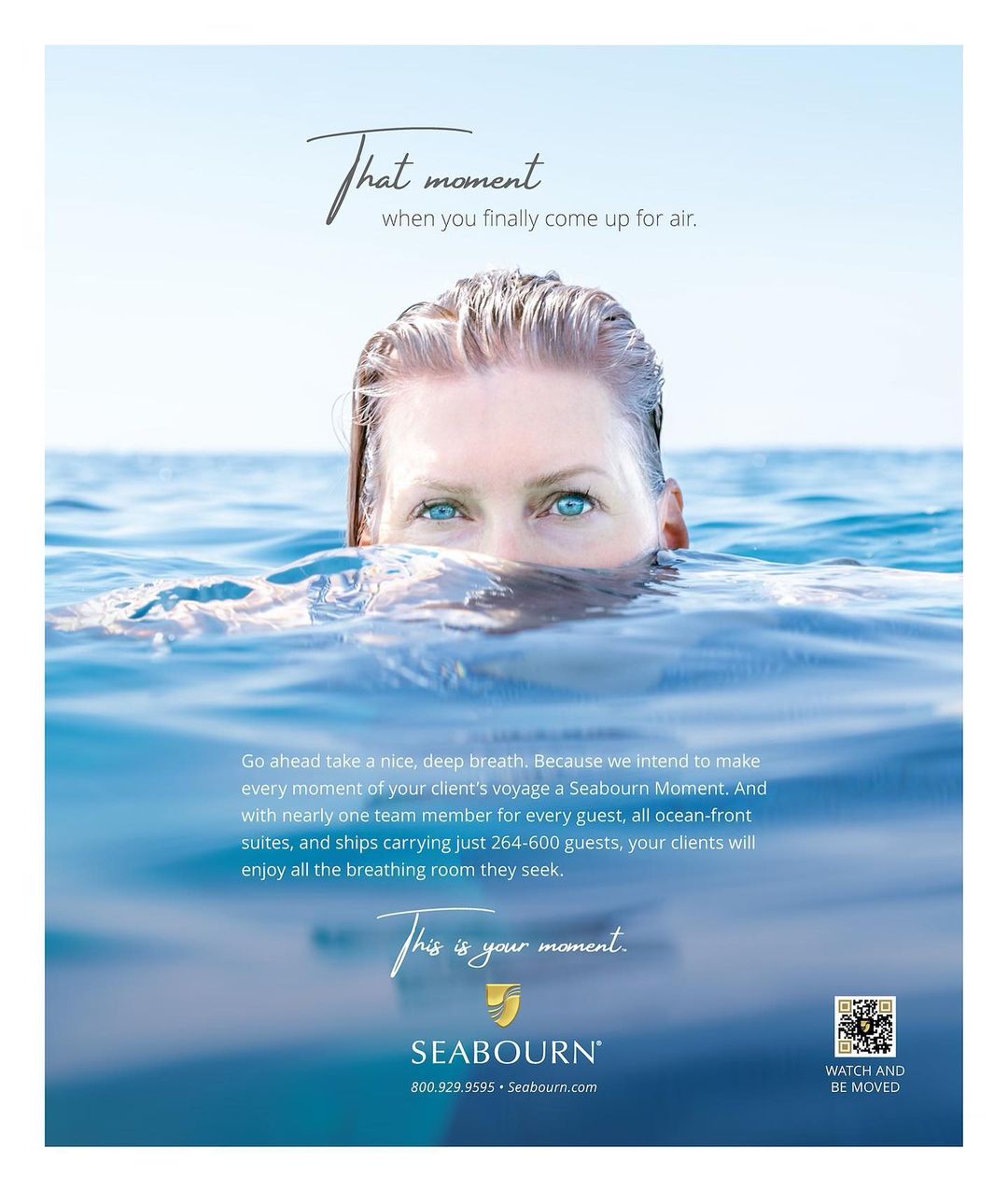 Woman's face and shoulders emerge from clear blue water in bright daylight, creating a refreshing ocean scene, promotional in style.