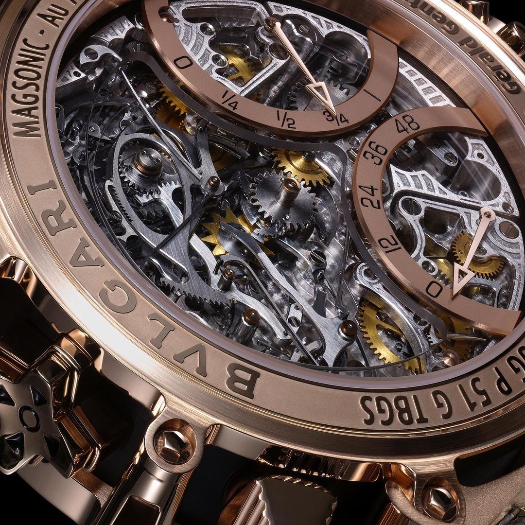 Close-up of an elaborate skeleton watch with exposed gears and gold accents, showcasing complex inner workings and intricate design.