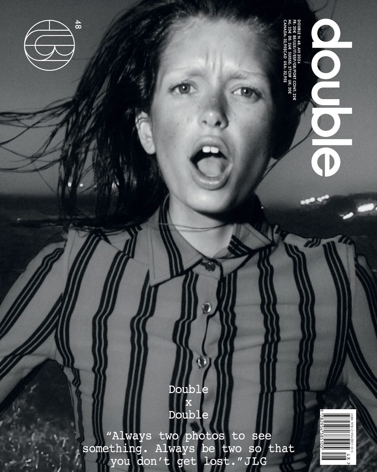Monochromatic portrait of a young person with an open mouth, wearing a striped shirt, set against a blurred cityscape at dusk.
