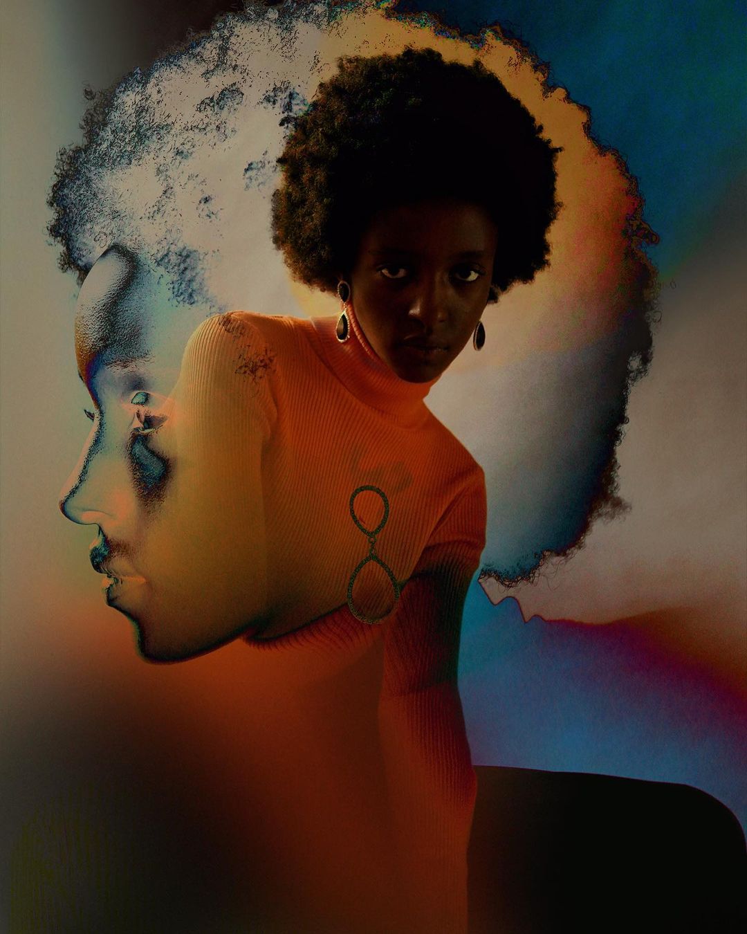 Portrait of a young African-descent woman with an afro, wearing orange turtleneck, side profile imposed, against diffused colorful background.