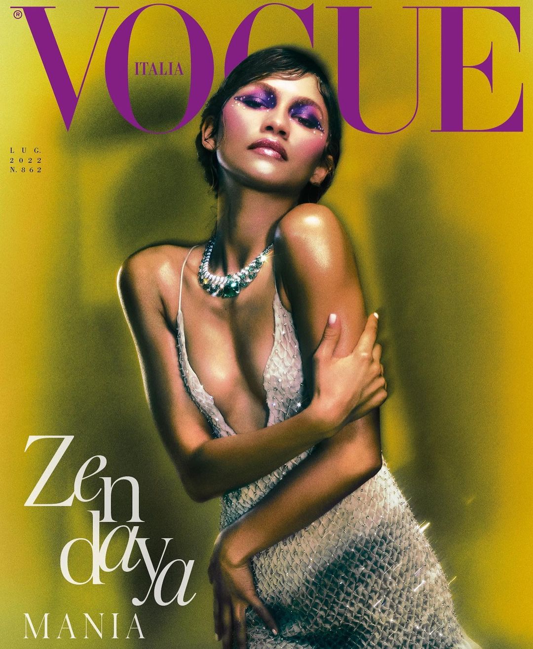 Zendaya graces the cover of Vogue Italia, luminous in a shimmery gown and statement necklace against a gradient yellow backdrop.