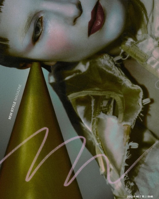 Conceptual beauty shot features a Caucasian woman with artistic makeup, a gold cone, and geometric line art in a studio setting.