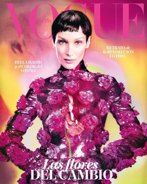 Vogue España cover featuring Bella Hadid in floral gown, with pink and yellow color grading. Magazine cover with floral theme.