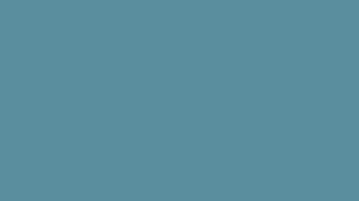 Solid background showcasing a blue-green hue, perfect for use as a texture, backdrop, or design element in various creative projects.
