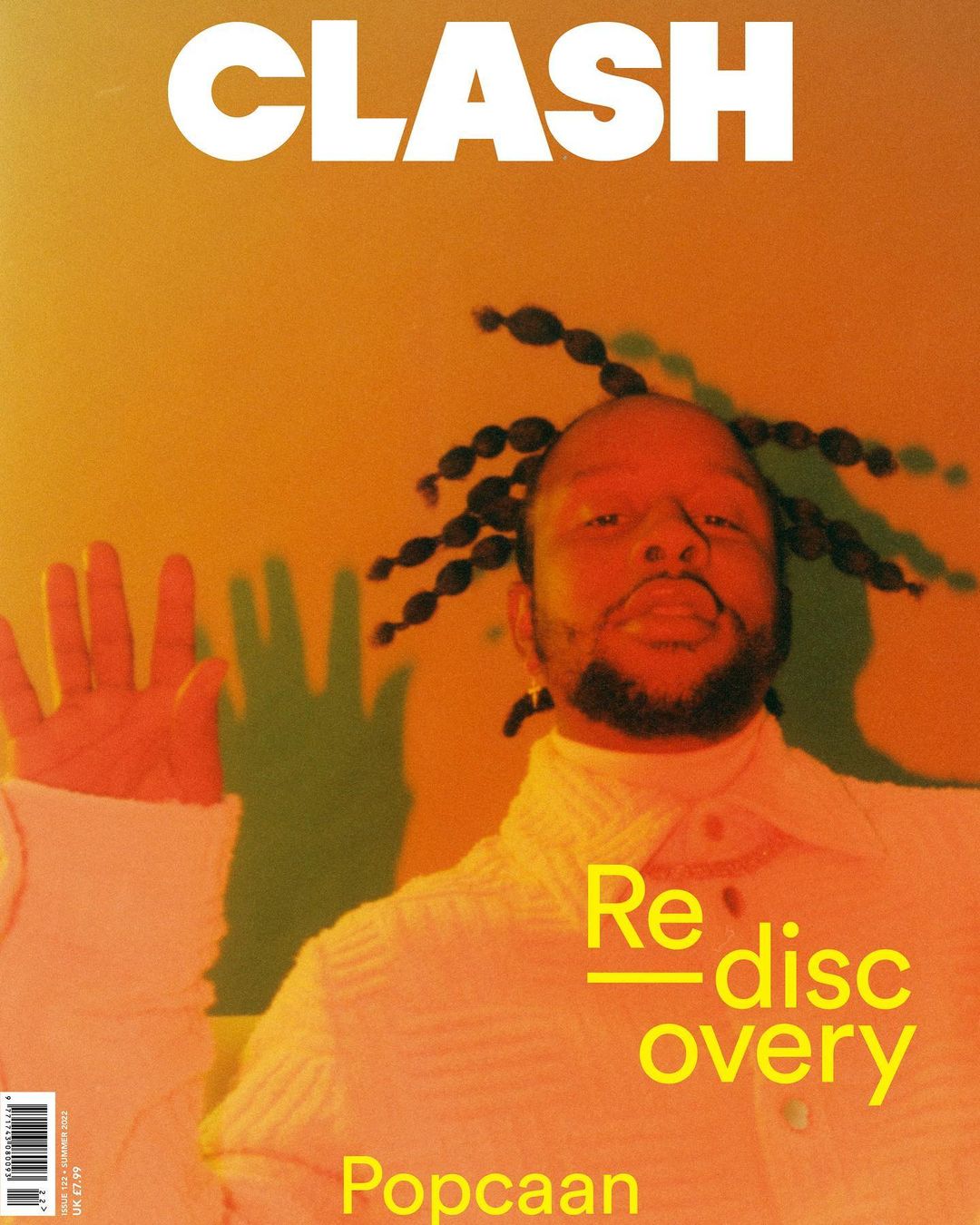 Clash magazine cover featuring Popcaan with his signature hairstyle and a warm color palette. The text says "Clash" and "Recovery."