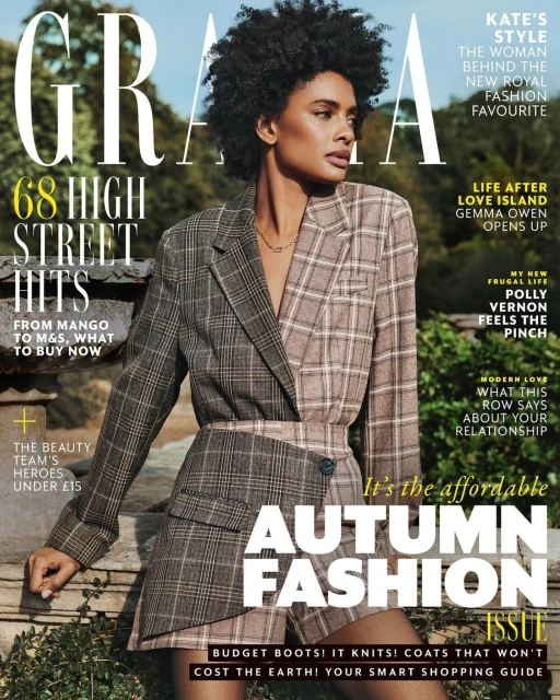 Fashion magazine cover featuring a woman in a plaid blazer and skirt with large GRAZIA masthead and article headlines in varied fonts and sizes.
