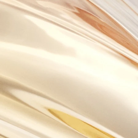 Abstract metallic gold fabric texture, creating a shimmering and luxurious visual effect with smooth, fluid lines and warm, reflective tones.