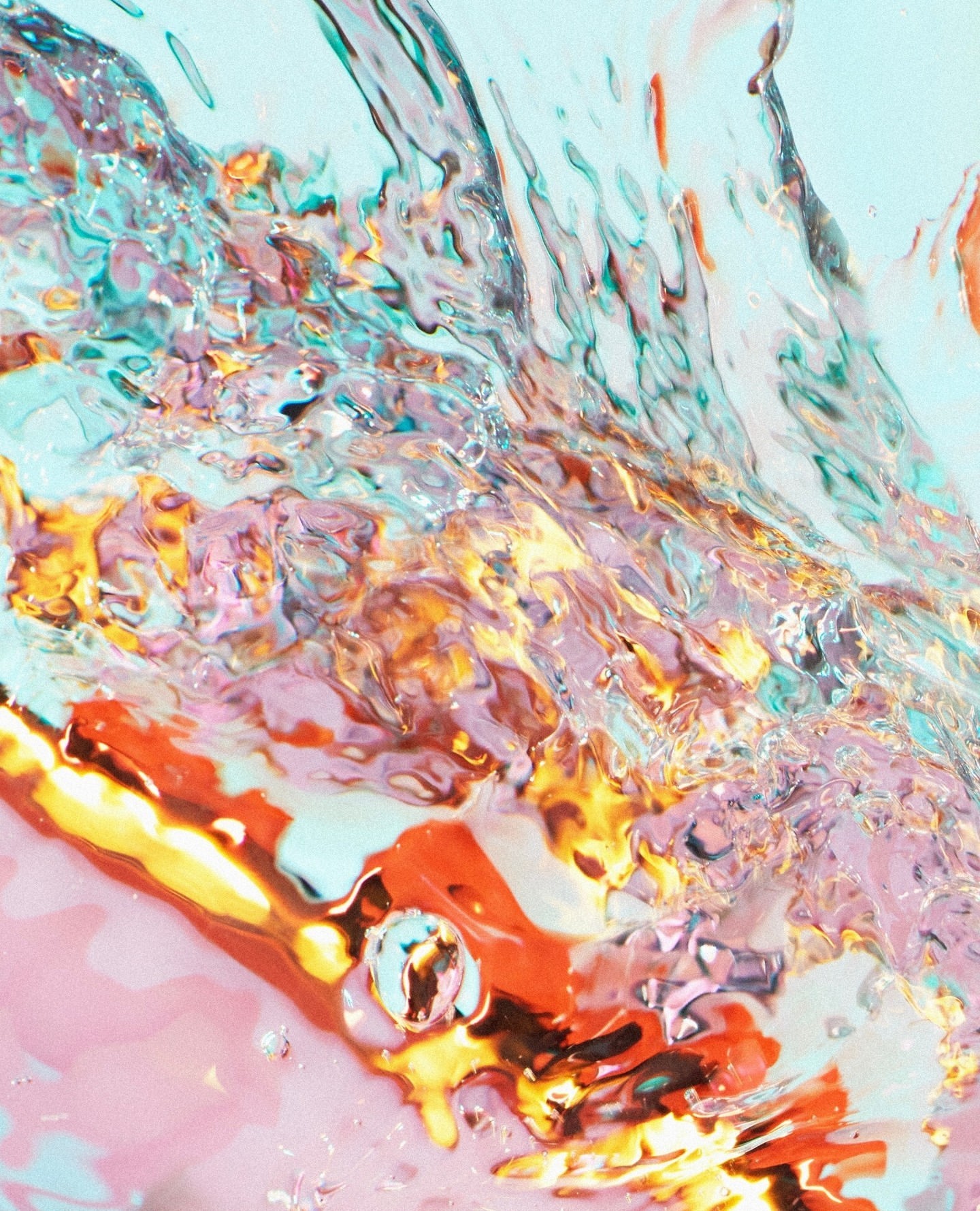 Abstract splash of vibrant colors with a flowing, liquid texture, featuring a blend of turquoise, pink, orange, and golden hues.