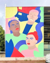 Colorful mural on a building exterior featuring three stylized figures with bold flat color blocks in red, yellow, blue, and green.