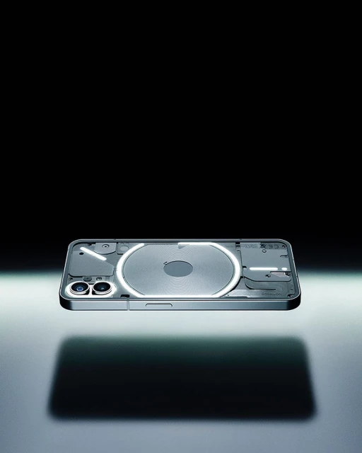 Nothing Phone (2a) with glowing glyph interface floating against a dark background, casting a shadow, product shot.