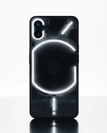 Black 'Nothing Phone' with illuminated glyph interface on a white surface. The phone features a unique transparent design and dual camera.